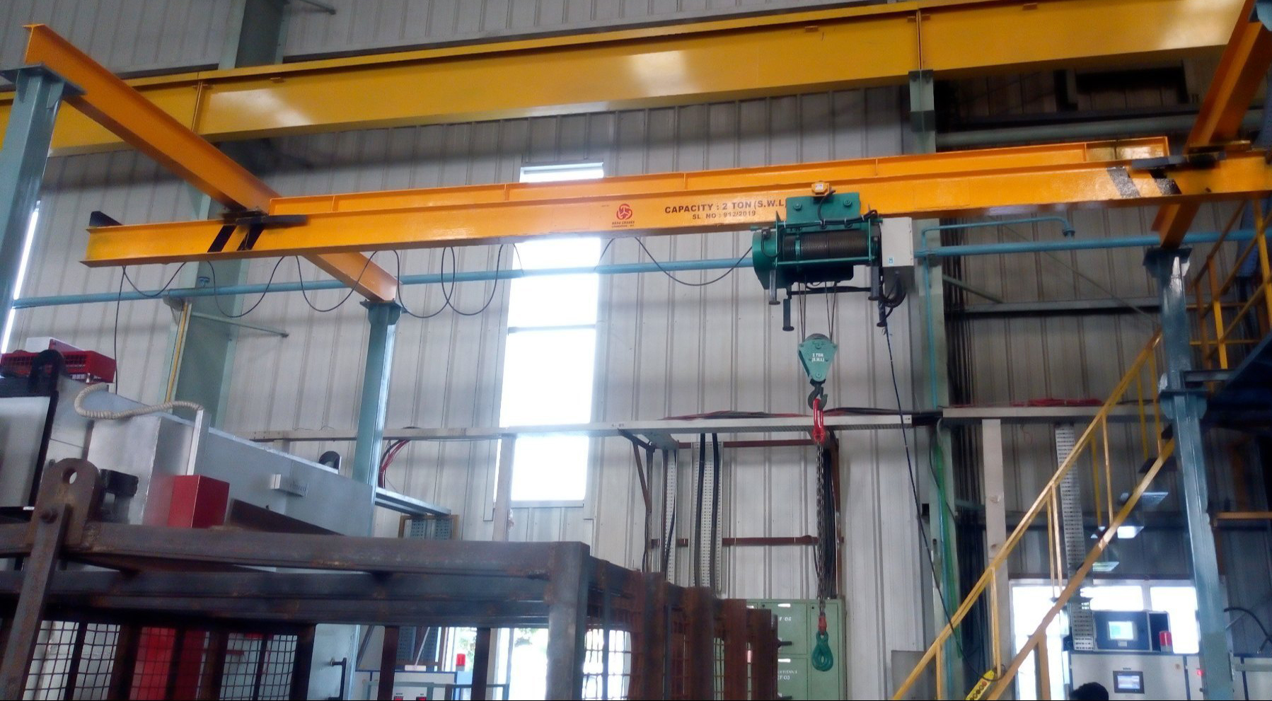 Image of a 1 Ton wire rope hoist suspended on a I-Beam